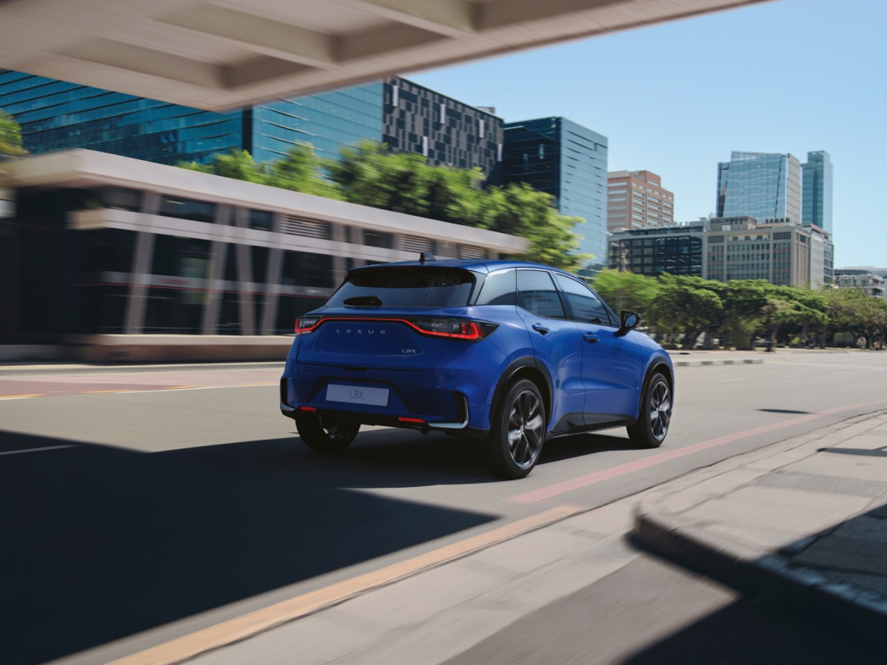 Lexus LBX driving in a city