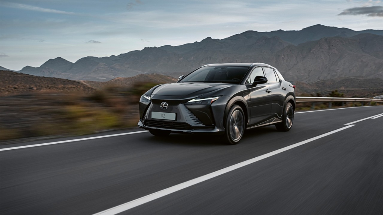 Lexus RZ 450e driving in a rural location