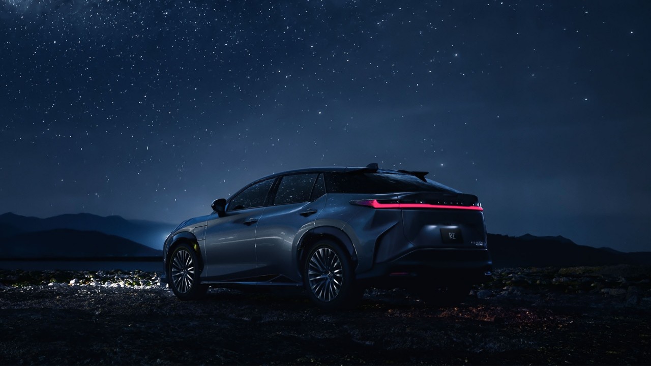 Rear view of the Lexus RZ 450e at night