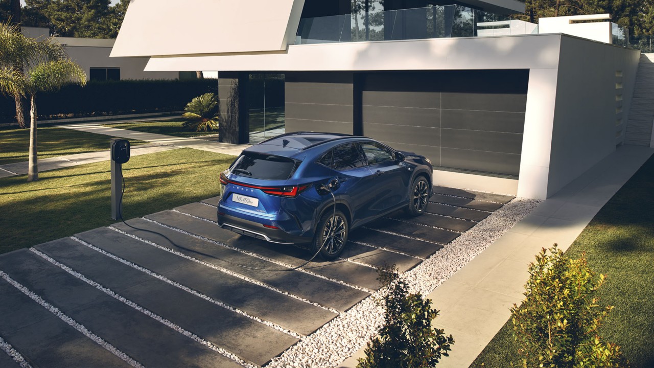 Lexus NX plugged into a charging station